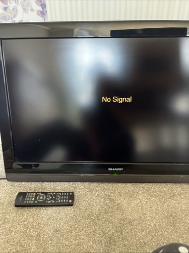 Sharp and remote - sharp, tv